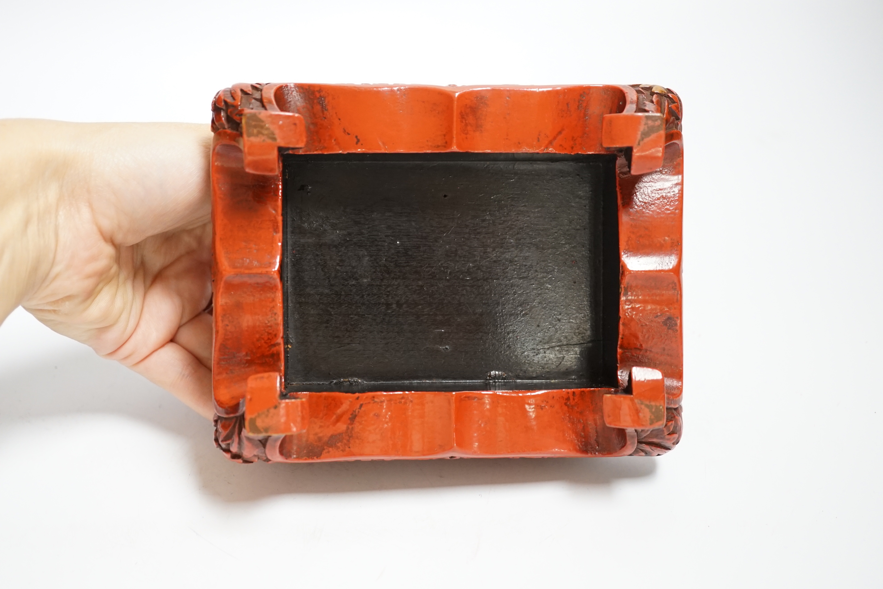 A 19th century Japanese lacquered and carved wood stand, 14.5cm